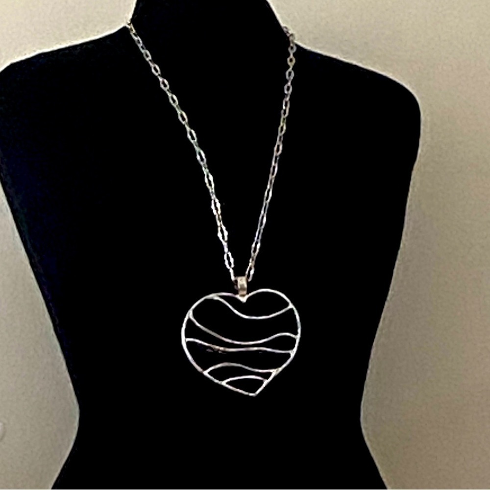 Large heart shaped silver tone necklace 40 inch chain. Heart- 3 1/2” tall & wide
